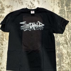 Stained Tee.  Sightly faded out from store display